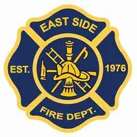 Blue and yellow St. George East Side Fire Dept. emblem, Est. 1976, with firefighting symbols.